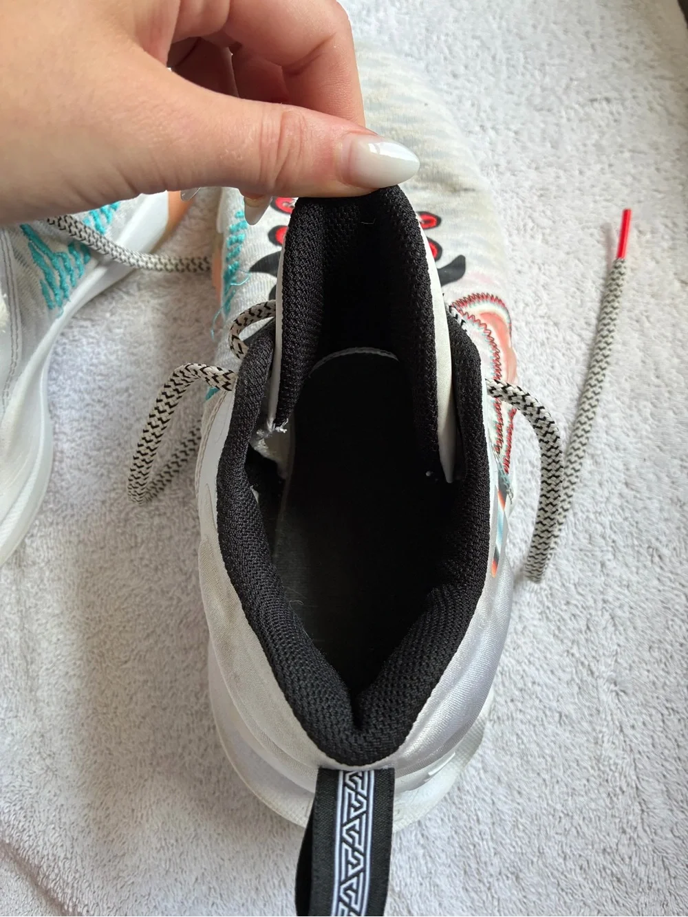 Nike Kids White Sneakers with Teal and Coral Accents